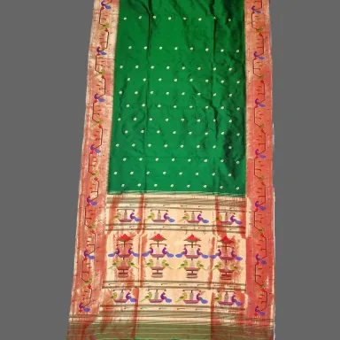 Intricate silk weave with gold zari border — Indian handloom